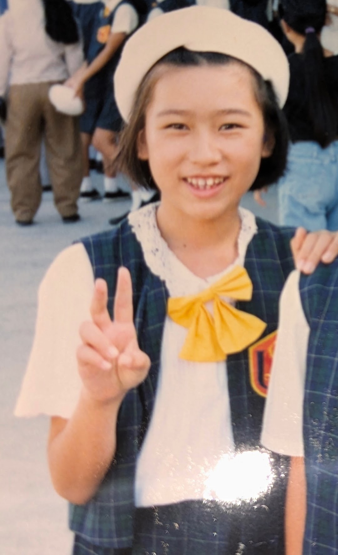 浦添少年少女合唱団時代の黄色い蝶ネクタイの写真
